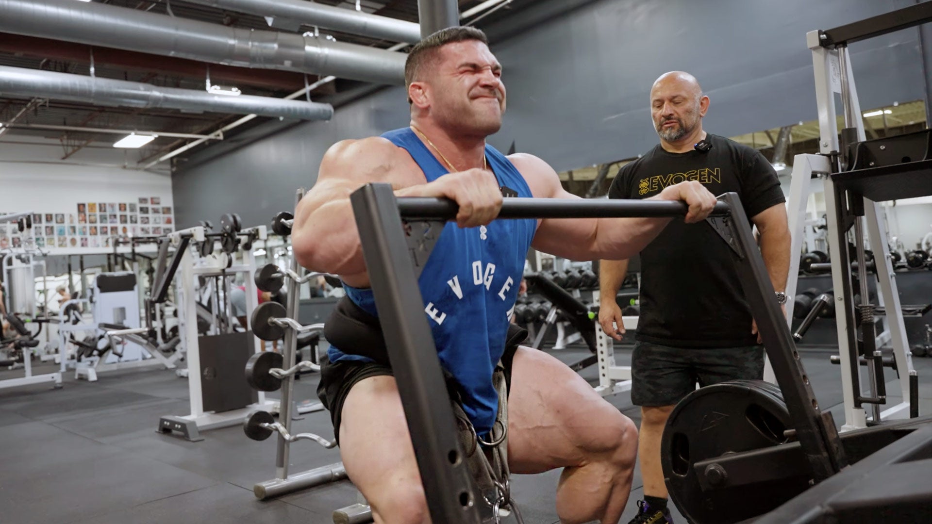 Derek Lunsford performing a belt squat in the gym